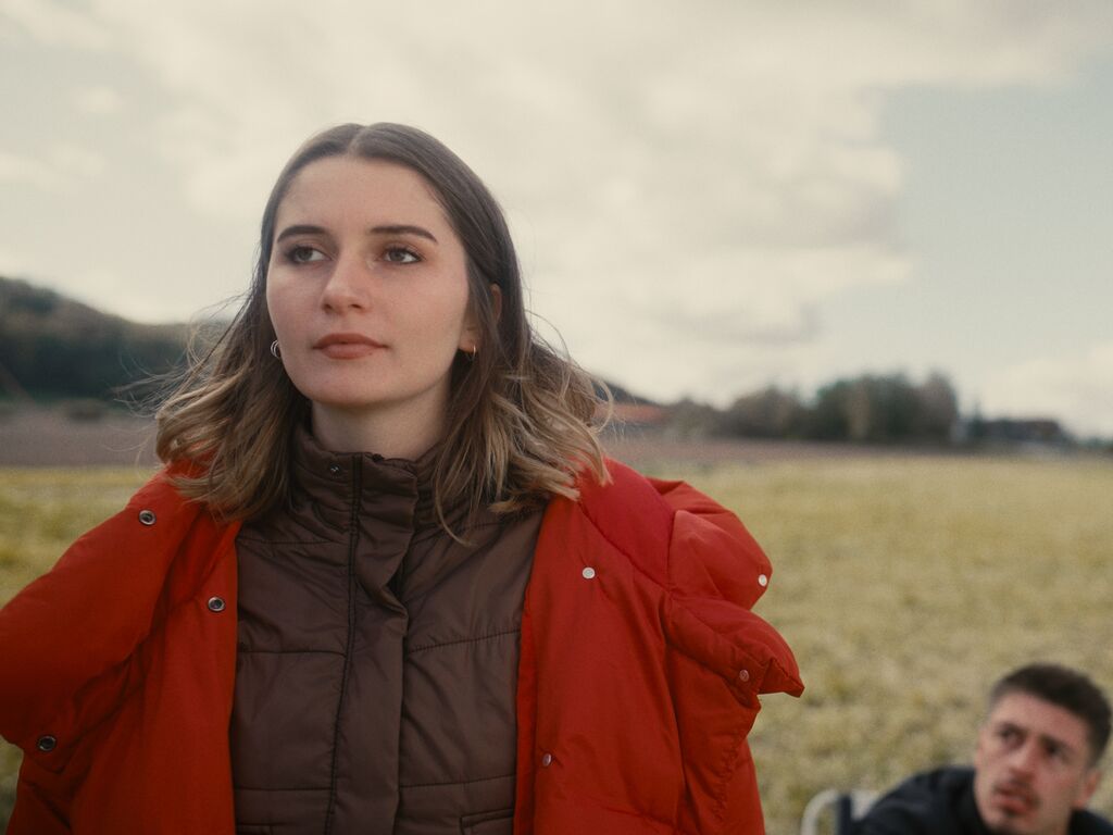 Portrait of a woman in a red jacket